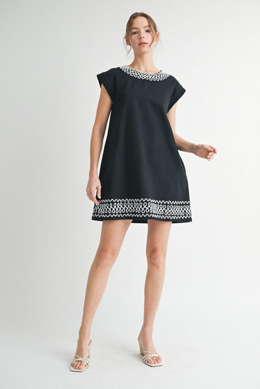 Black Mini Dress (corre grande)